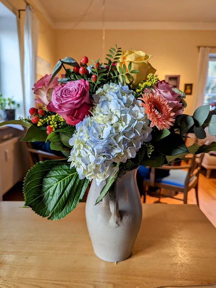 Blumenstrauss in der Hand