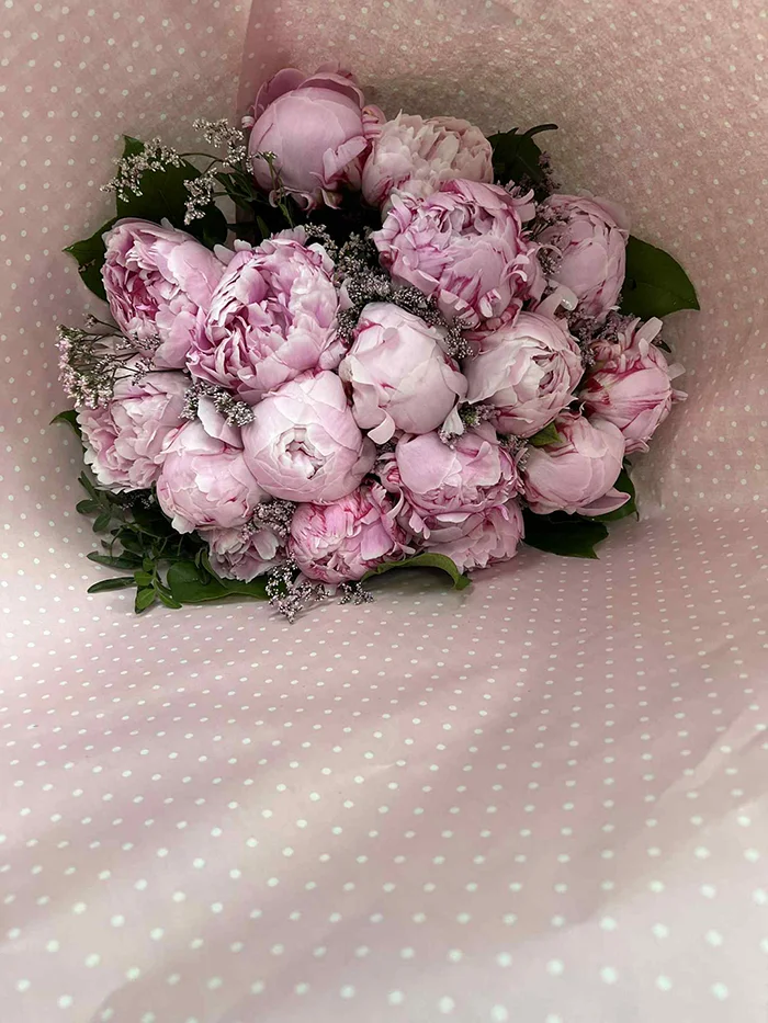 Blumenstrauss in der Hand