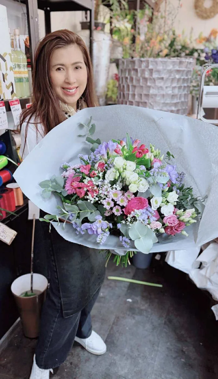 Blumenstrauss in der Hand
